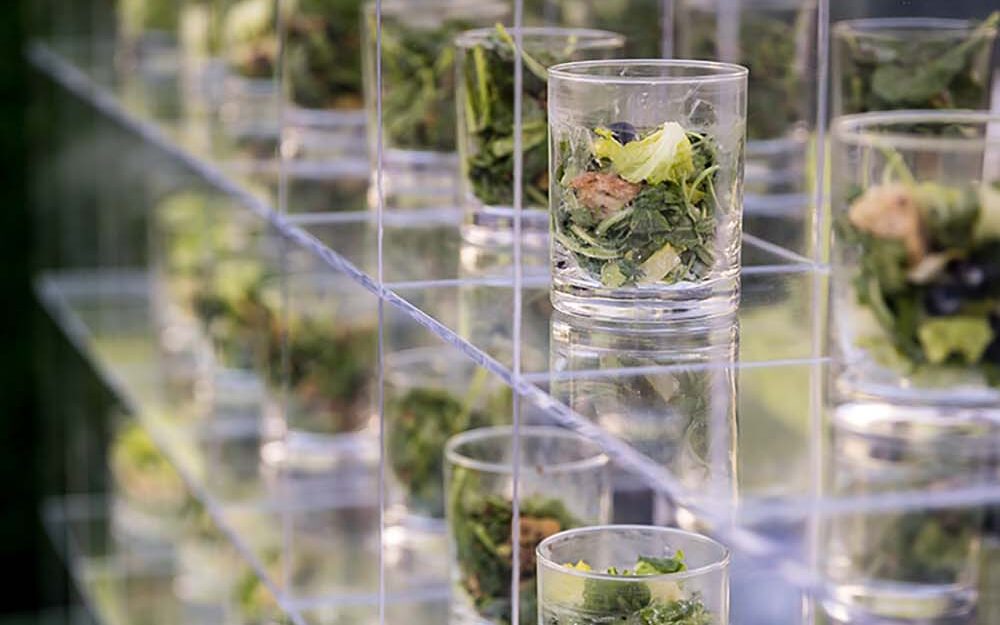 Good Gracious! Events in Los Angeles serves individual servings of greens from a salad wall.