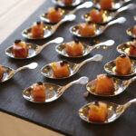 Caterers are often presenting appetizers in safe single servings.