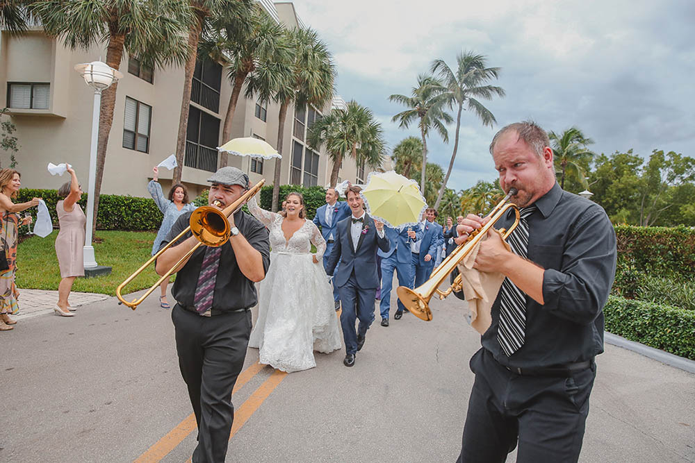 A couple danced with their guests in a New Orleans-style second-line parade planned by Willard. Photo by Emily Harrison Photography