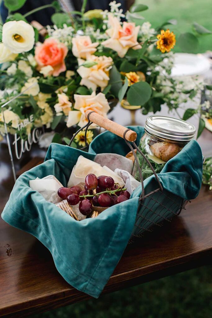 Individual picnic baskets for cocktail hour at a Social Maven event. Photo by Shaw Photography Co.