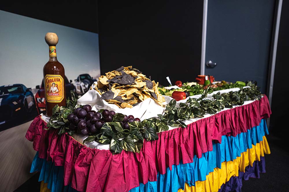 A C&C Kitchen lunch buffet, featuring a decorated salsa bar.