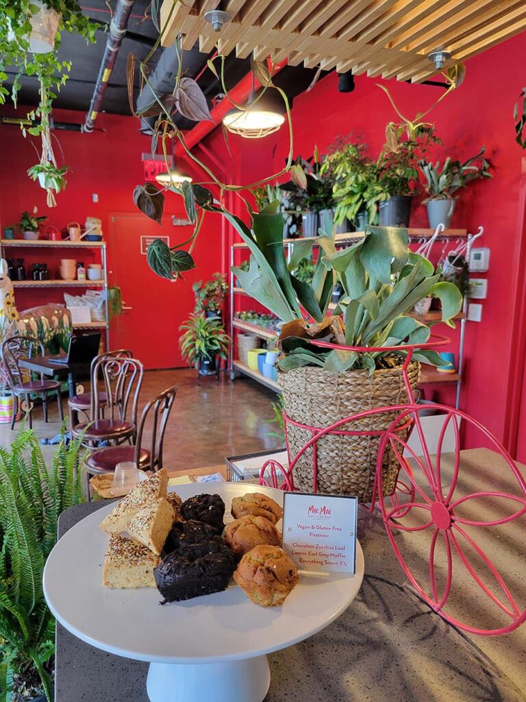 Customers can pick up vegan and gluten-free pastries, as well as potted plants, at Mae Mae Café.