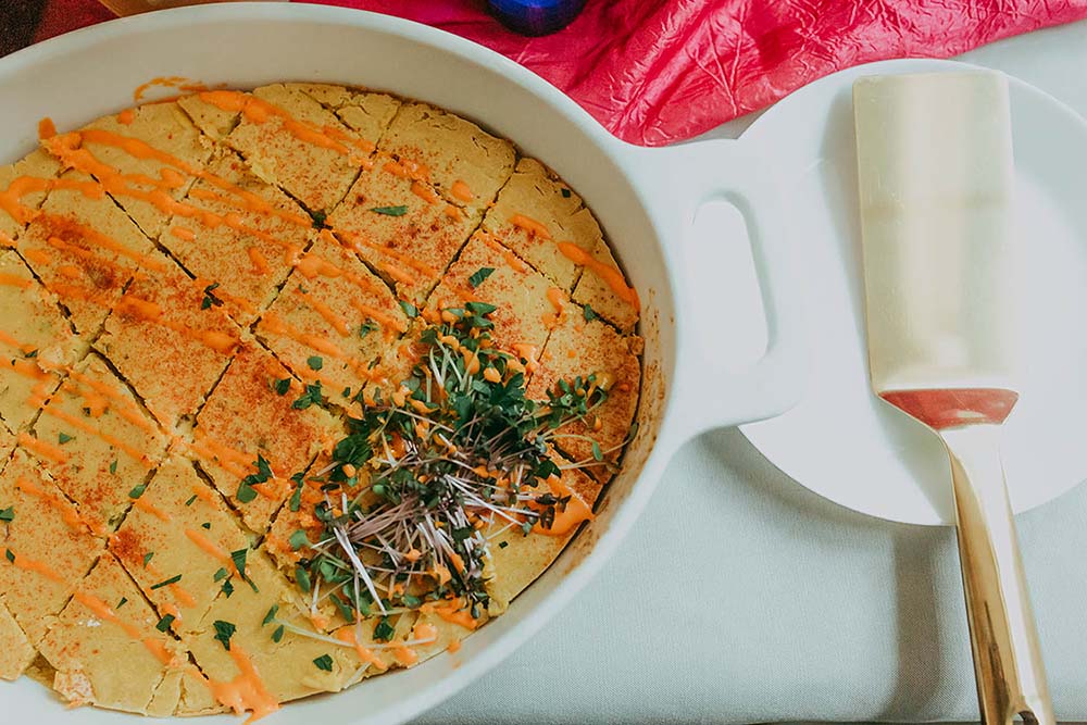 Amelia Irene Catering does a brisk brunch business, including this vegan chickpea frittata with roasted red pepper coulis. Photo by Kiara Harris
