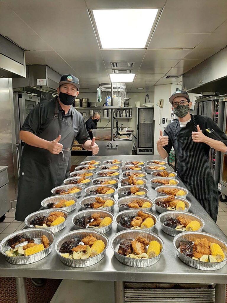 Scottsdale-based Hotel Valley Ho employees prepare excess food to be donated.