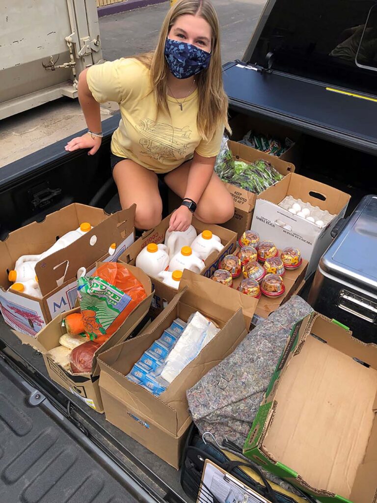 MealConnect volunteer Sami Hollinshead with a food pickup.