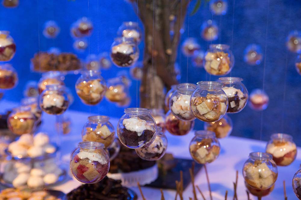 Eye-catching treats from Marcia Selden Catering include a dessert tree of deconstructed cake globes. Photo by Hechler Photographers