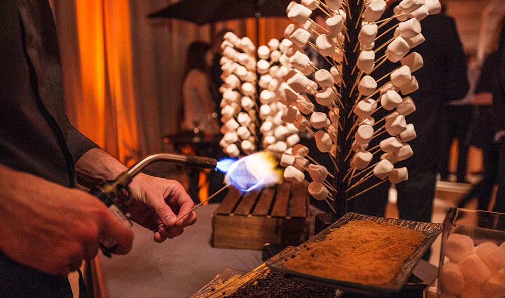 The Flaming S'mores station from Arthur's Catering captures guests' attention.