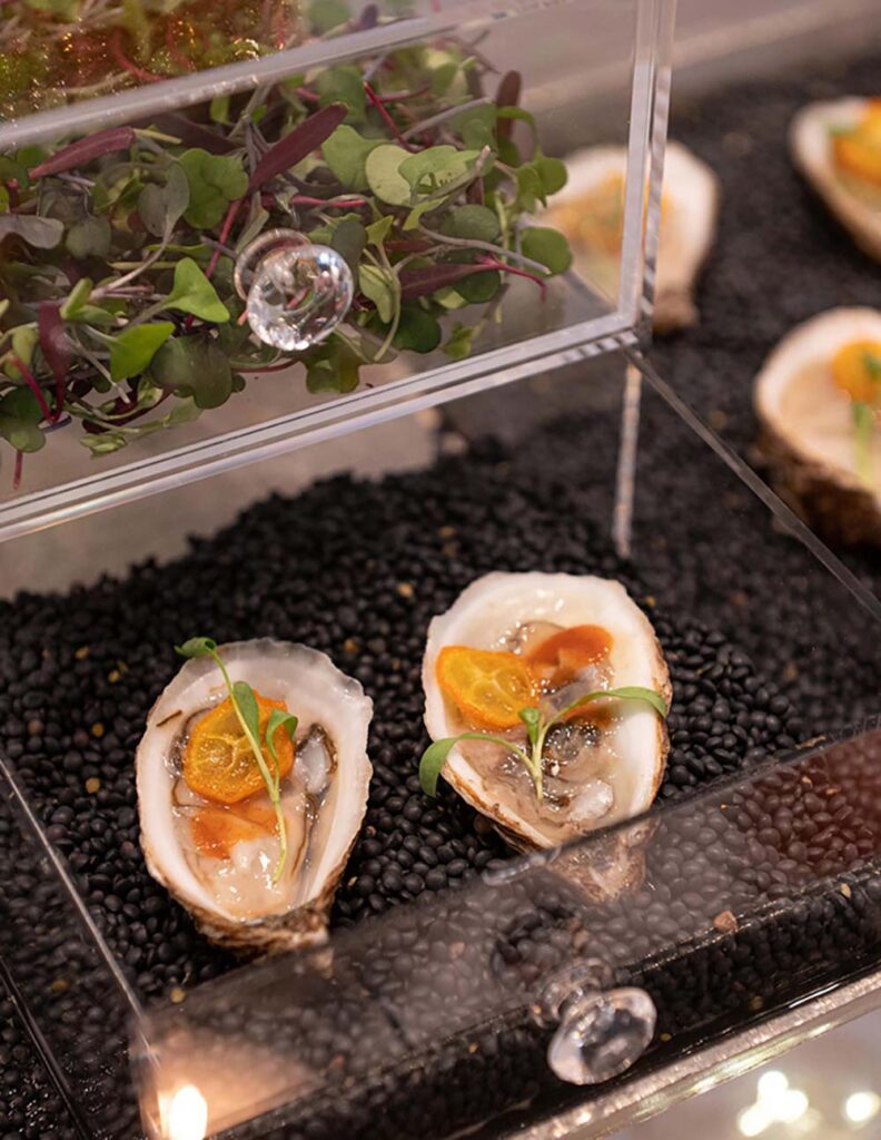 Proof of the Pudding’s Bubbles & Bites station features a variety of fresh oysters. Photo by Jack Prada Photography