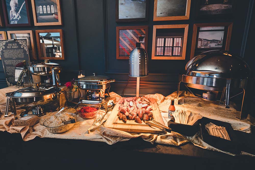 Funky’s Catering celebrates a legendary local supplier with Avril Bleh’s Sausage Station. Photo by Sarah Babcock Studio