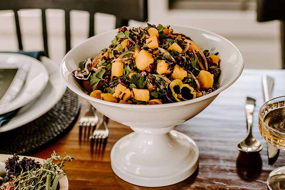 D’Amico Catering’s Minnesota Wild Rice Salad with pomegranate seeds, pickled red onions, roasted squash, pecans and maple mustard vinaigrette. Photo by Kathryn Eurman Photography